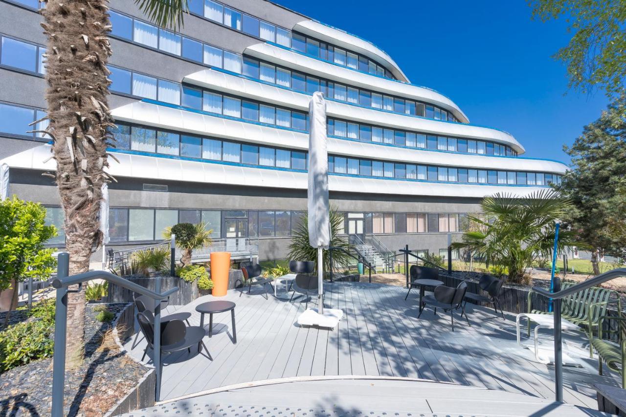 Novotel Poitiers Site Du Futuroscope Чассенеуил-Ду-Поитоу Экстерьер фото