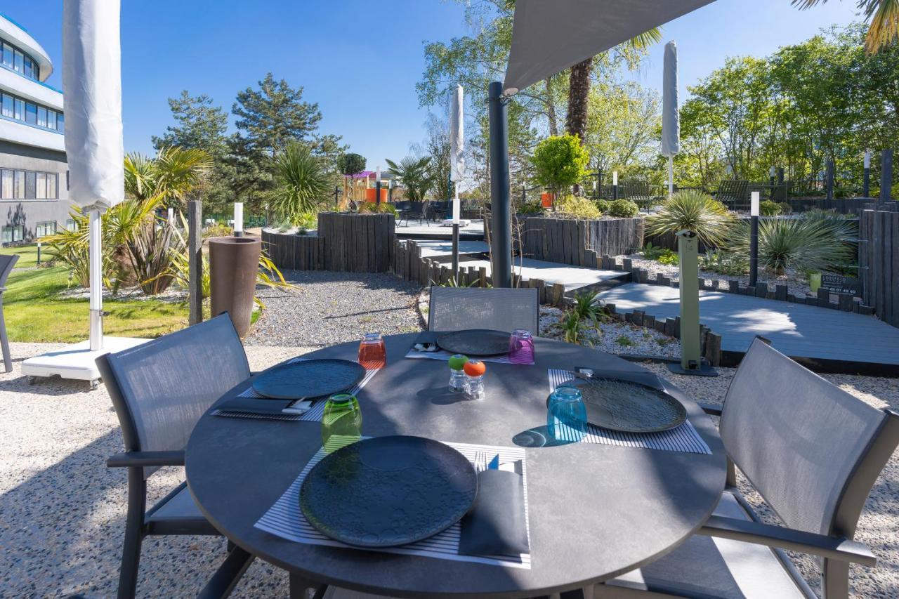 Novotel Poitiers Site Du Futuroscope Чассенеуил-Ду-Поитоу Экстерьер фото