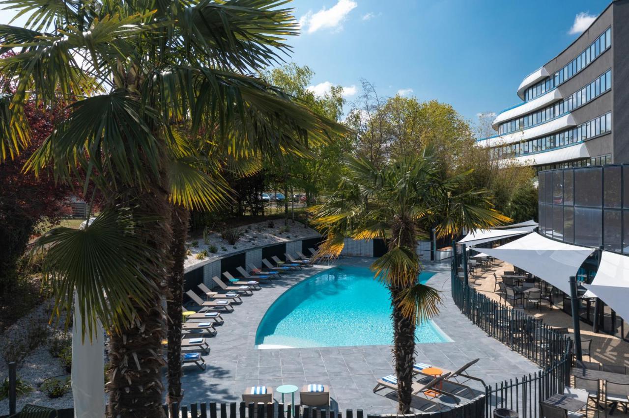 Novotel Poitiers Site Du Futuroscope Чассенеуил-Ду-Поитоу Экстерьер фото