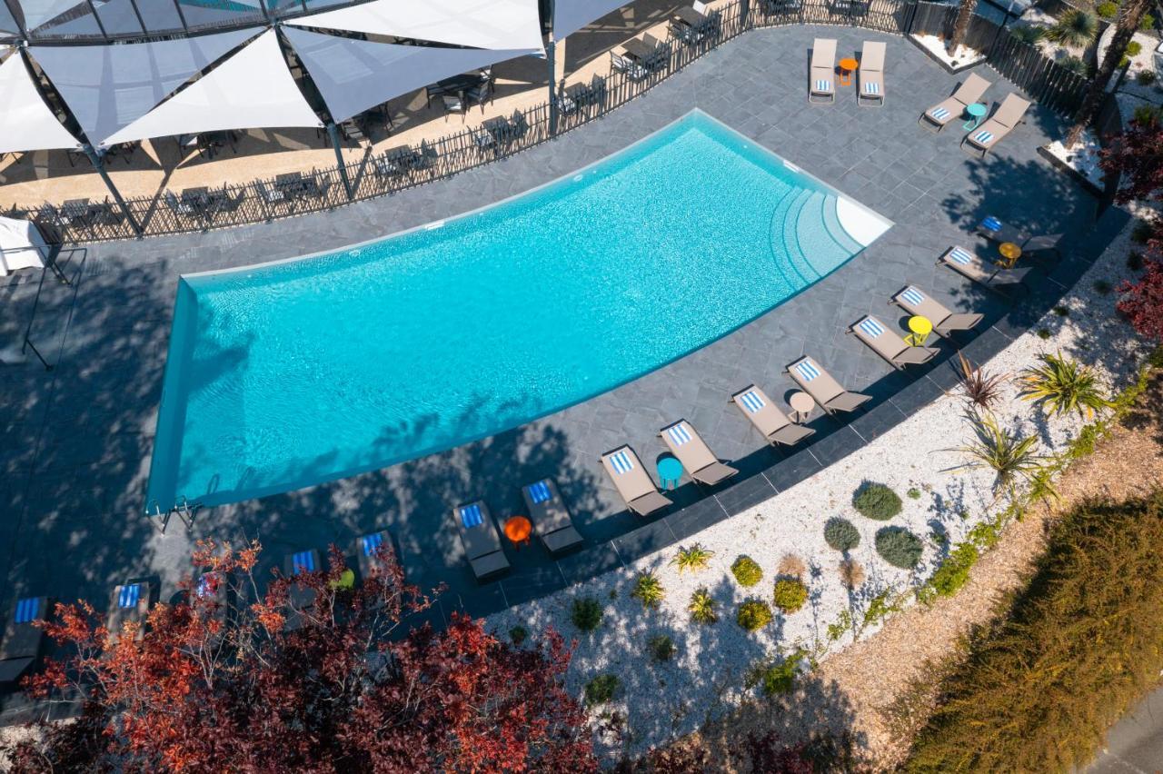 Novotel Poitiers Site Du Futuroscope Чассенеуил-Ду-Поитоу Экстерьер фото